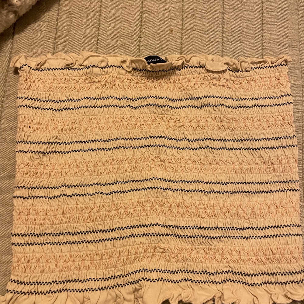 Worn once. Like new condition.